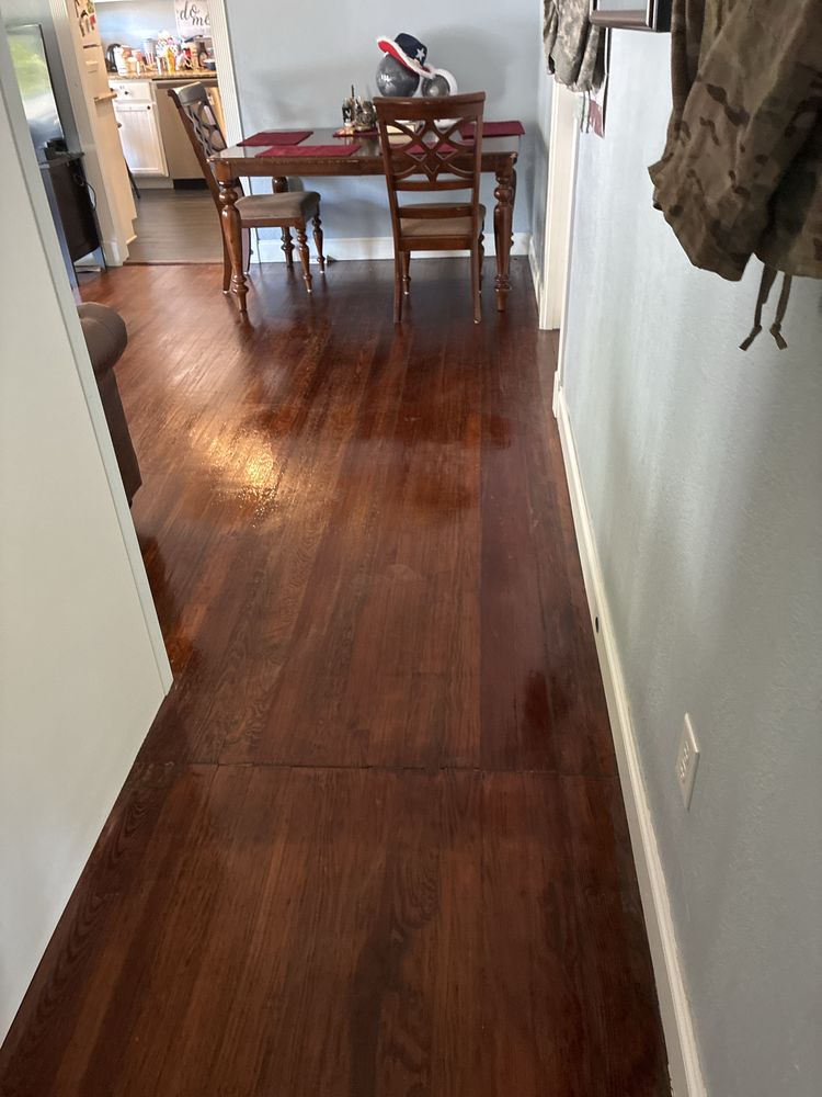 Polished hardwood hallway after professional cleaning